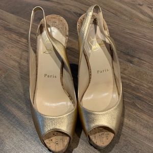 Gold Christian Louboutin shoes